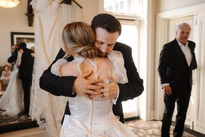 A series of black and white wedding photos showing tender moments between couples in formal attire.