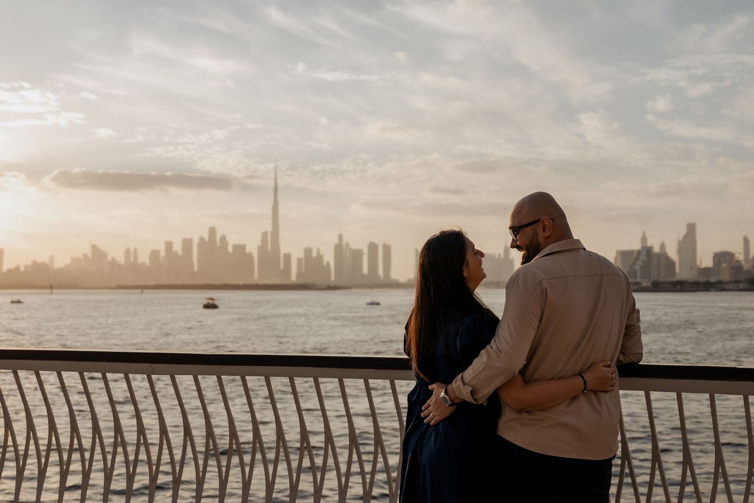 Romantic couple photoshoot in Dubai with skyline view at sunset
