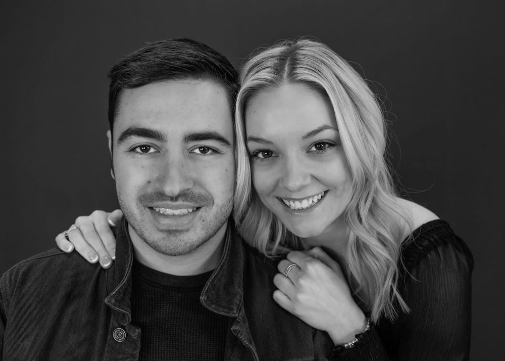 A series of black and white portraits showing couples in close embraces and joyful expressions.