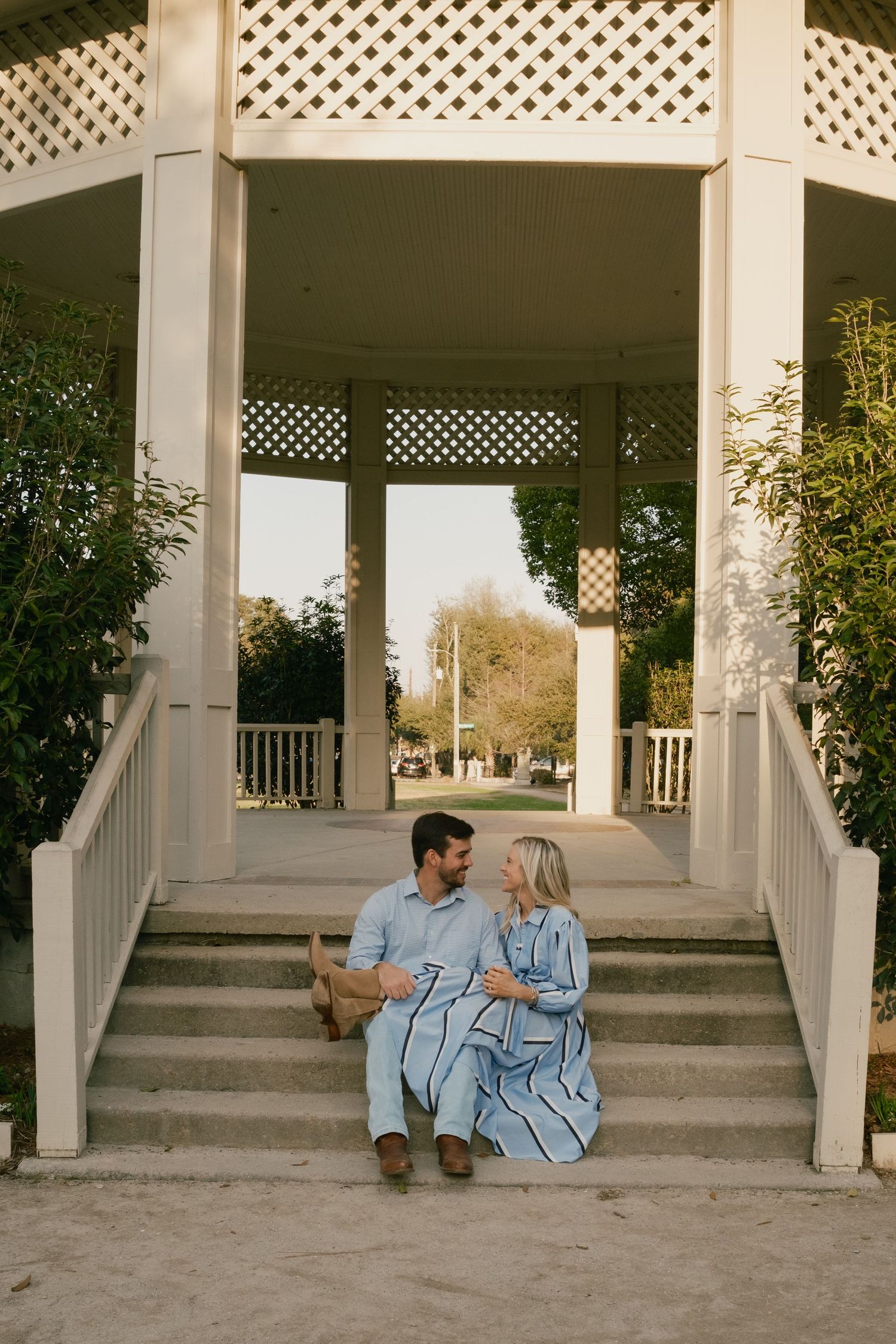 Charleston couples session in Hampton Park smiling on a beautiful day