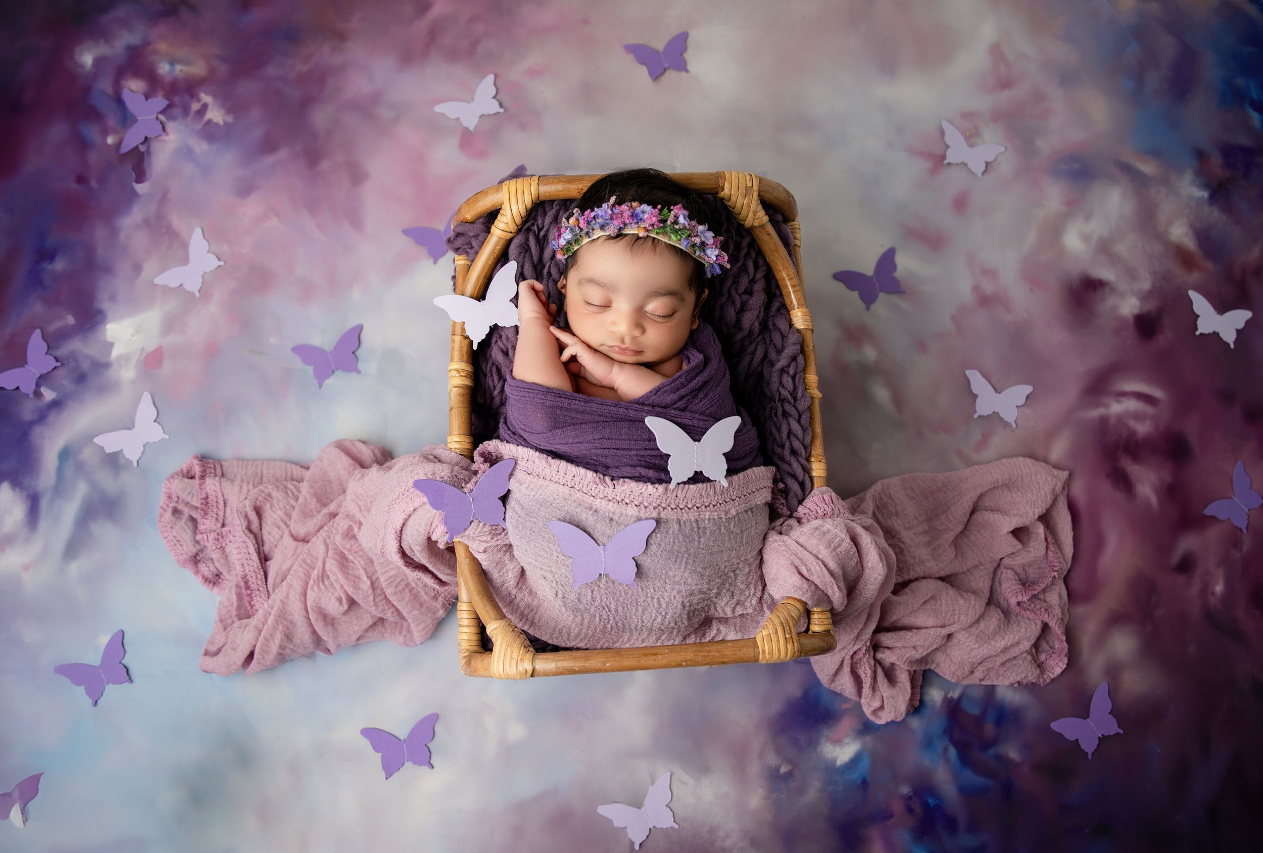 new born baby with butterfly - Jasmeet K Photography