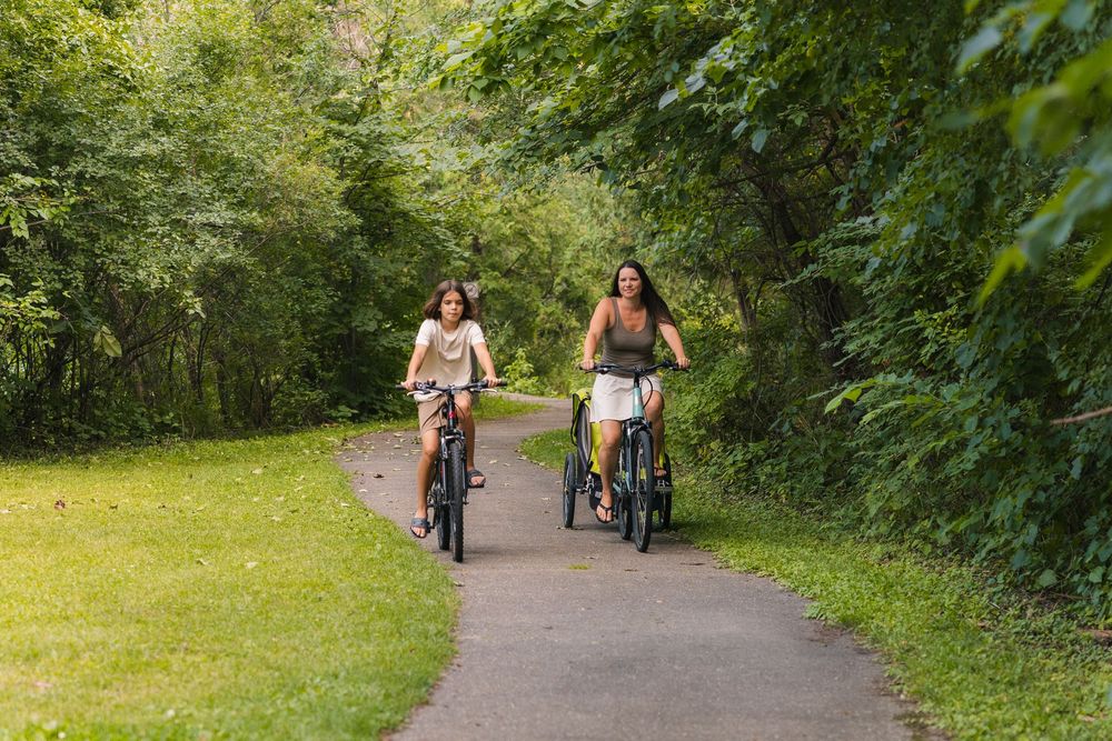 madison wi family photographer lifestyle portraits cinematic documentary summer bike riding teens lake kegonsa stoughton cottage grove park