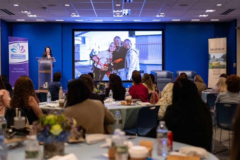 Empower at NYC teachers conference discussing the need for support in youth loosing a parent