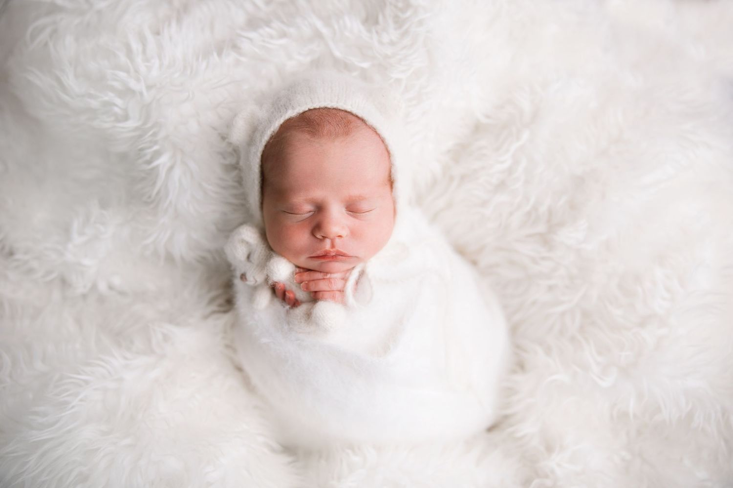 Angelic sleeping pose. Newborn profile portrait. Arkansas Newborn Photographer.