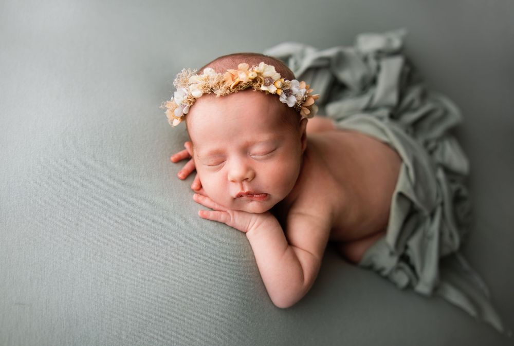 Angelic sleeping pose. Newborn profile portrait. Arkansas Newborn Photographer.