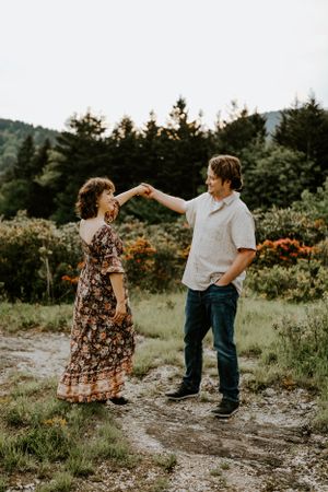A couple spins on a mountain top on the Blue Ridge Parkway in Western North Carolina just outside of Asheville