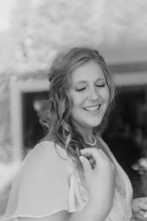 a bride shot in black and white looking down