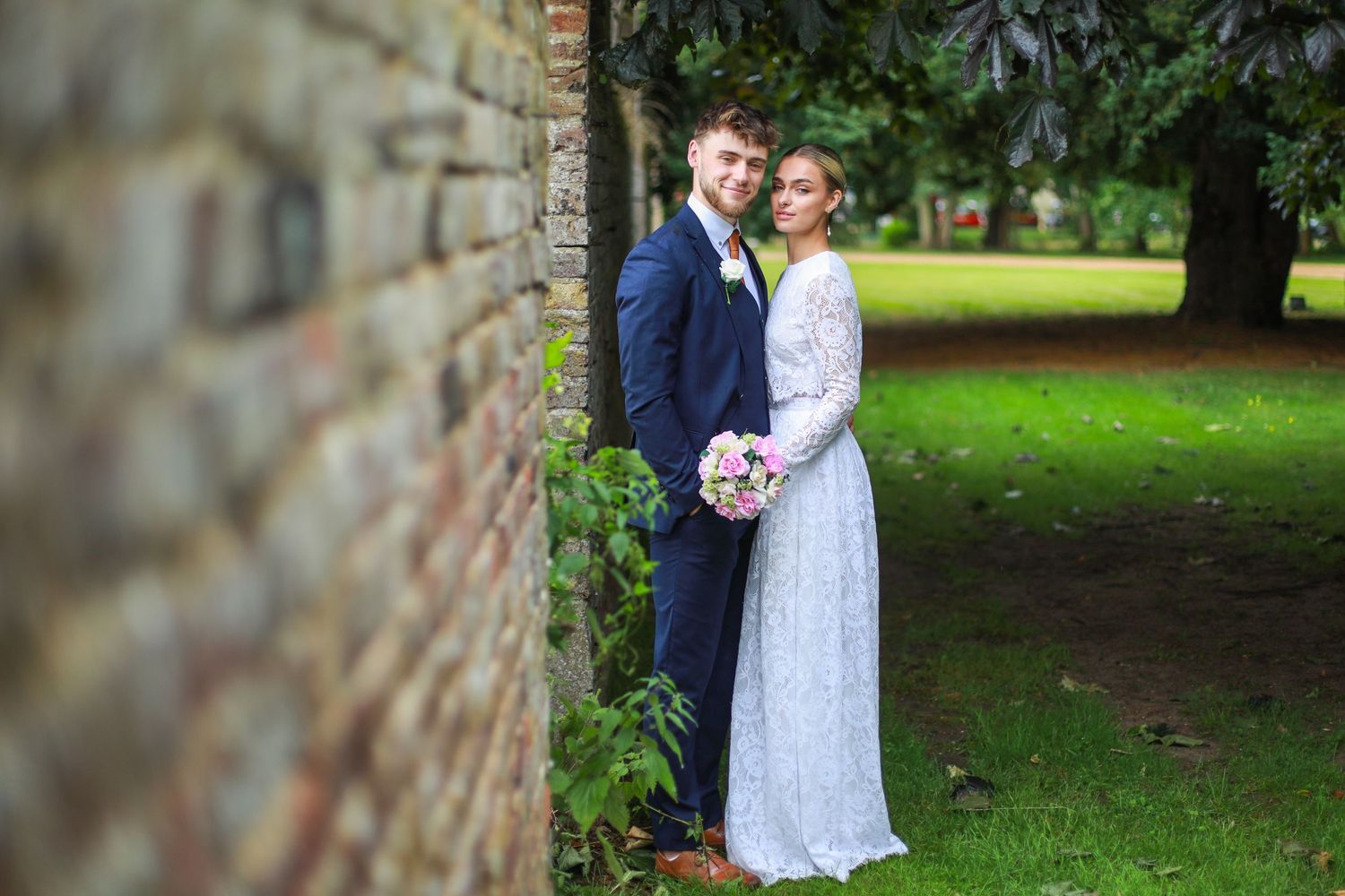 Photo of bridge and groom at wedding venue