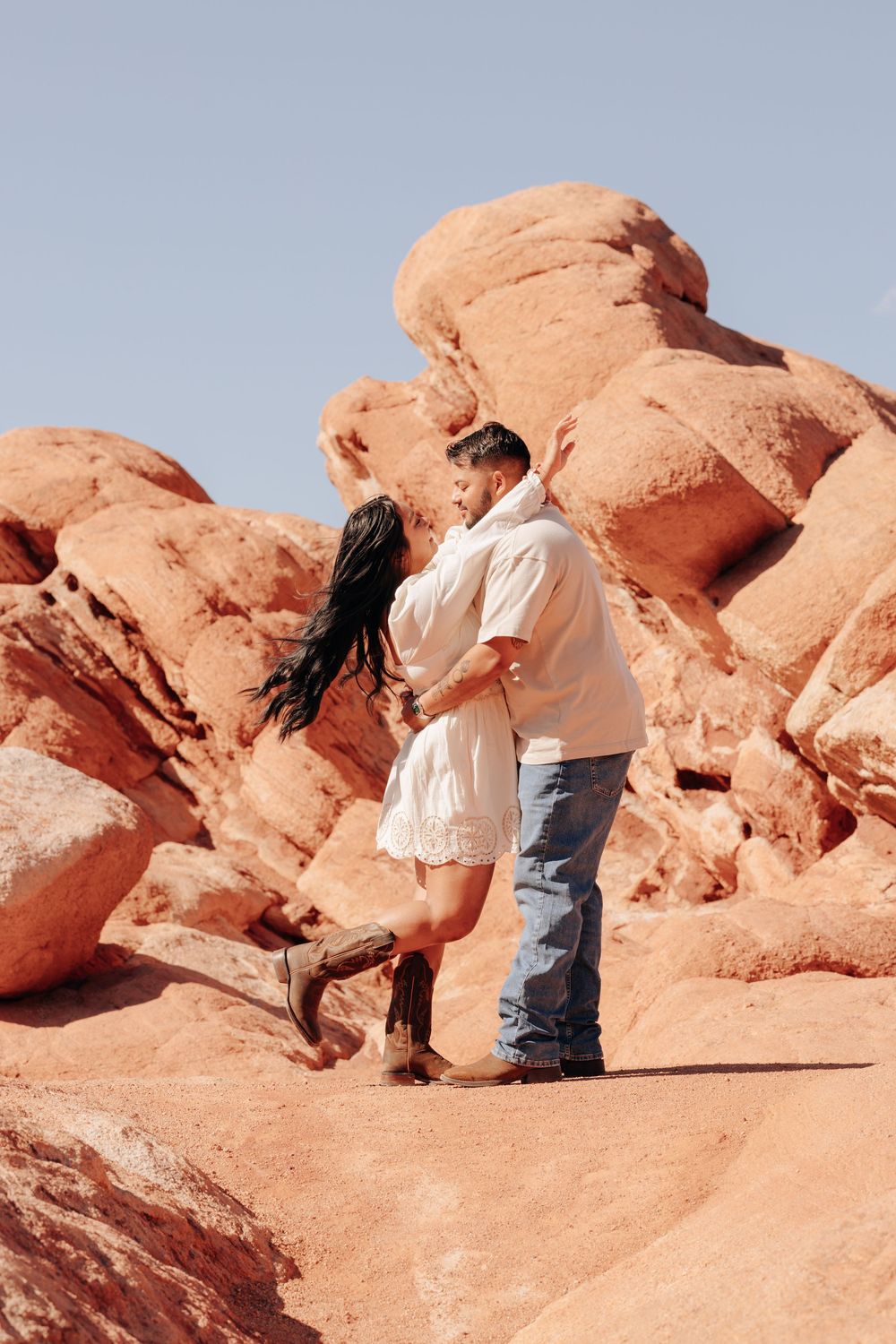 couple in front of garden of the gods