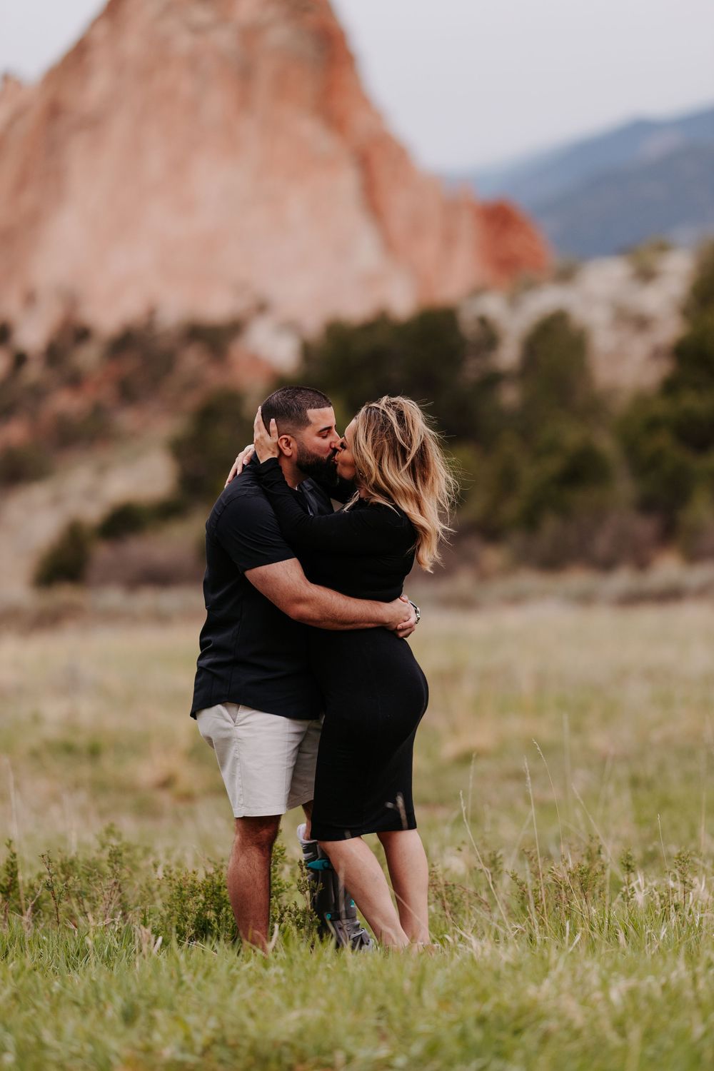 couple in front of garden of the gods