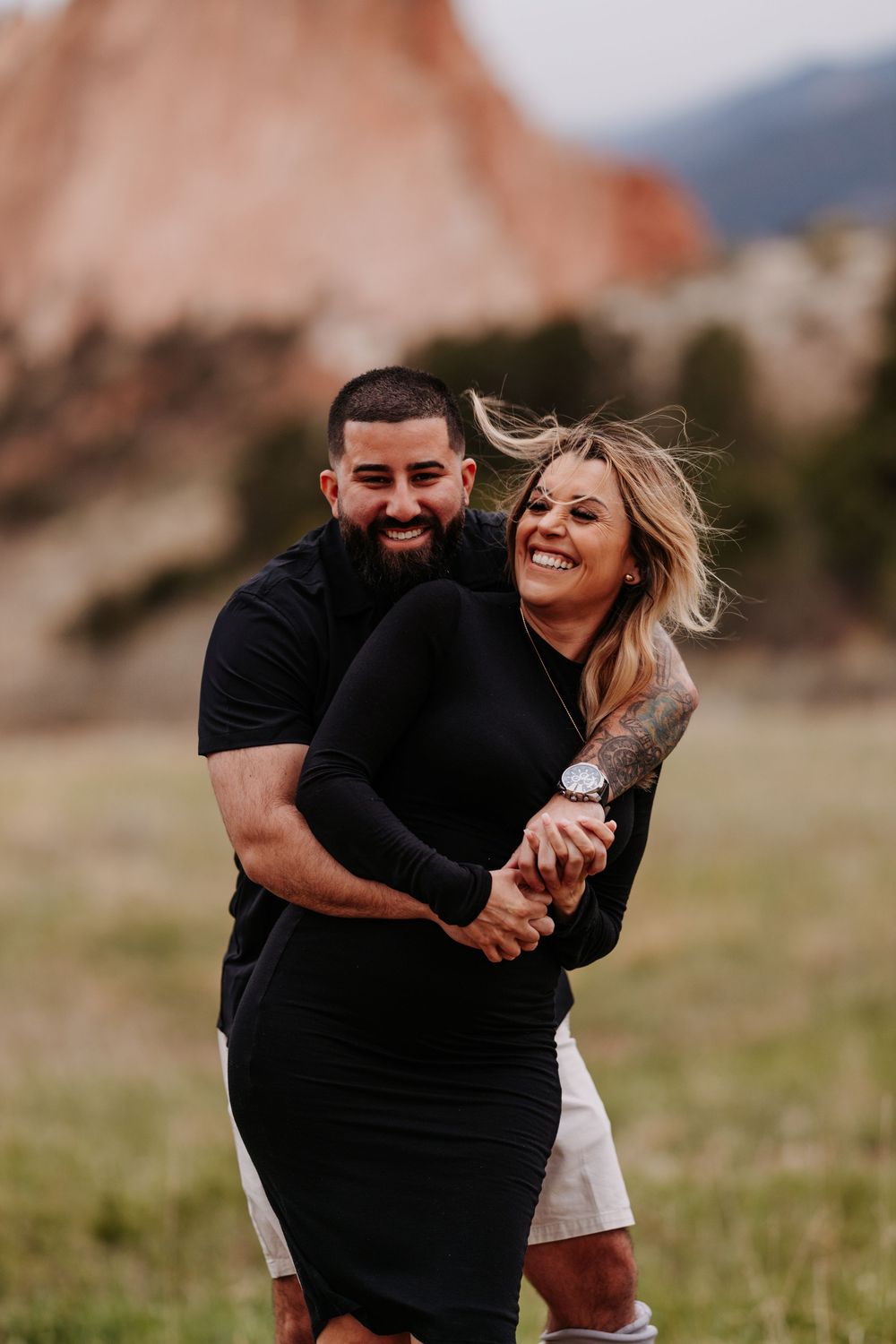 couple in front of garden of the gods