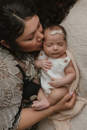 intimate mother and child close up shot during newborn portrait session Tyler Tx Newborn Motherhood photographer