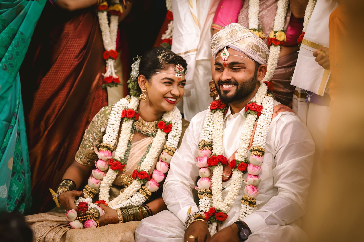 Traditional South Indian wedding ceremony with colorful decorations and rituals.