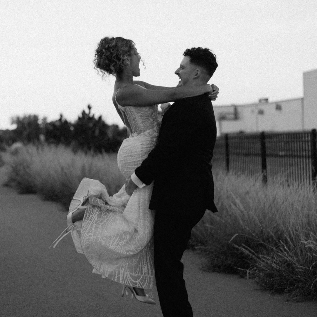 Romantic black and white wedding photos in outdoor setting.