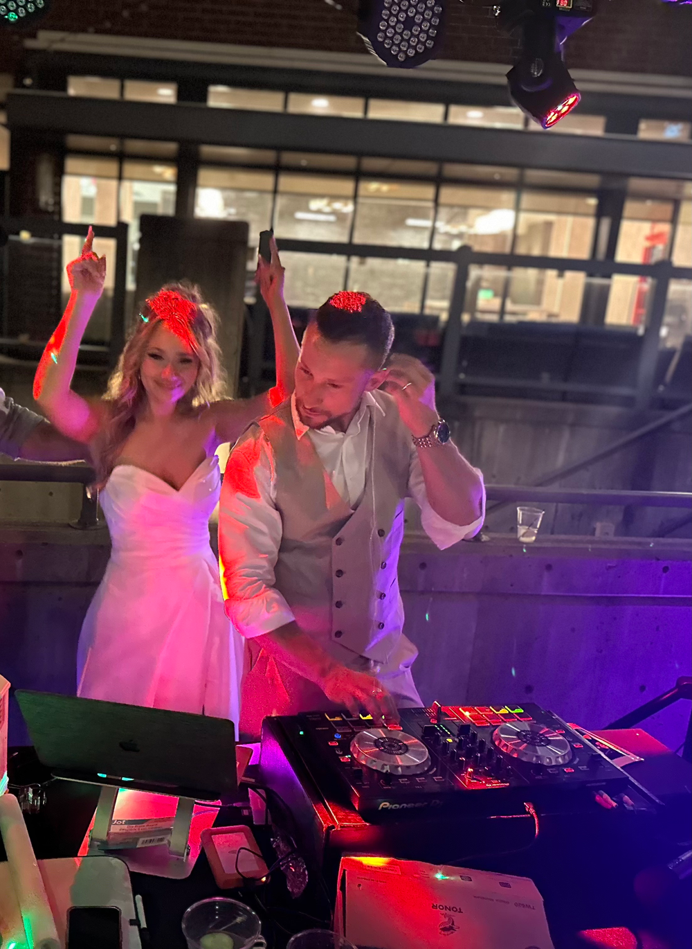 Fun fact: I love to DJ! This is my husband and I DJ for our own guests. The best memory of my wedding day!