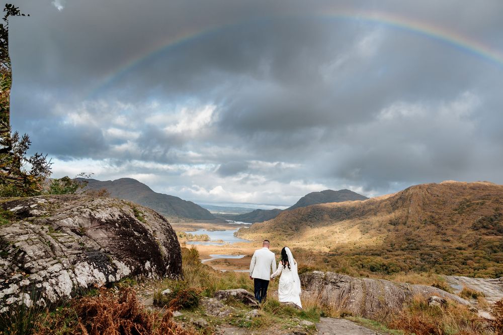 Scenic mountain landscape panorama with dramatic cloudy skies and rugged terrain in the Scottish Highlands.