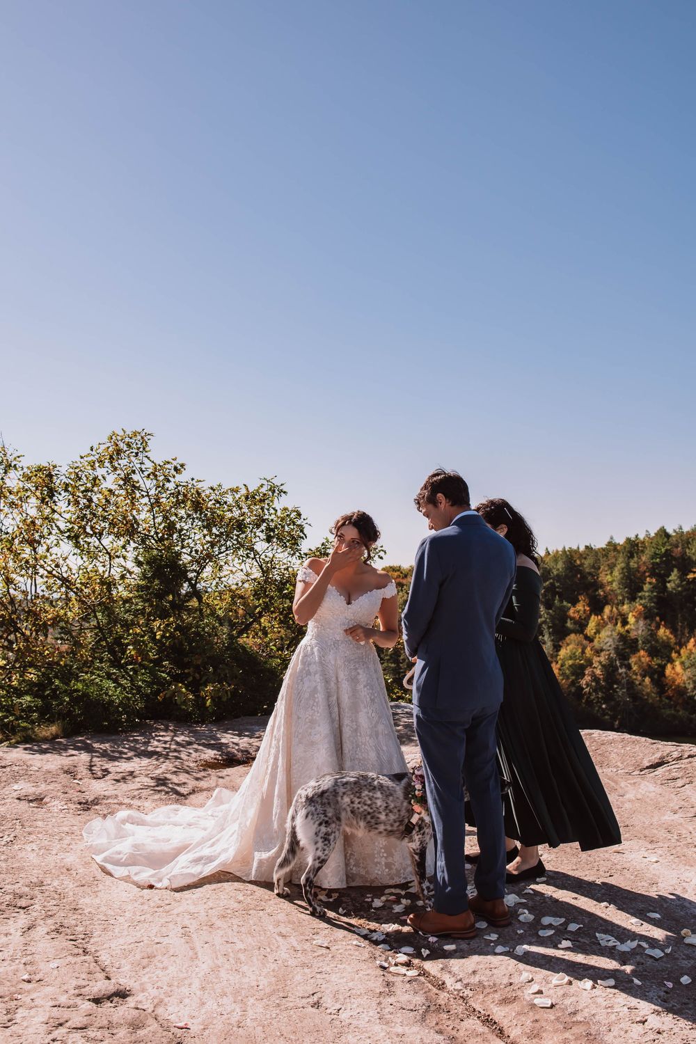 Bride tearing up during wedding vows at minnewaska state park adventure elopement