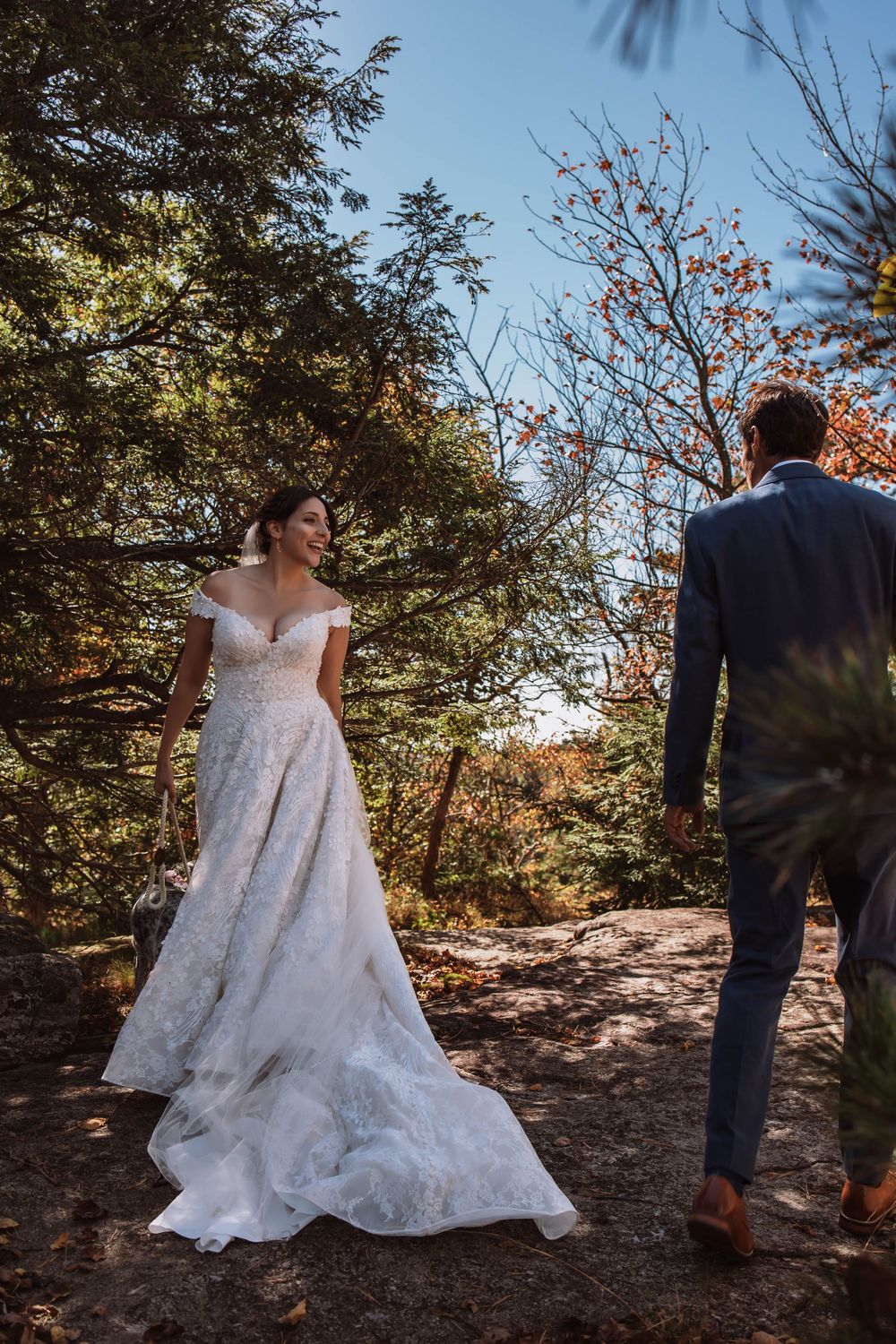 Couple sharing a silly intimate moment together at their adventure elopement at Minnewaska State Park