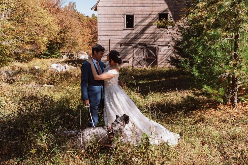 Bride and Groom sharing an intimate moment during their adventure elopement hike at Minnewaska state park