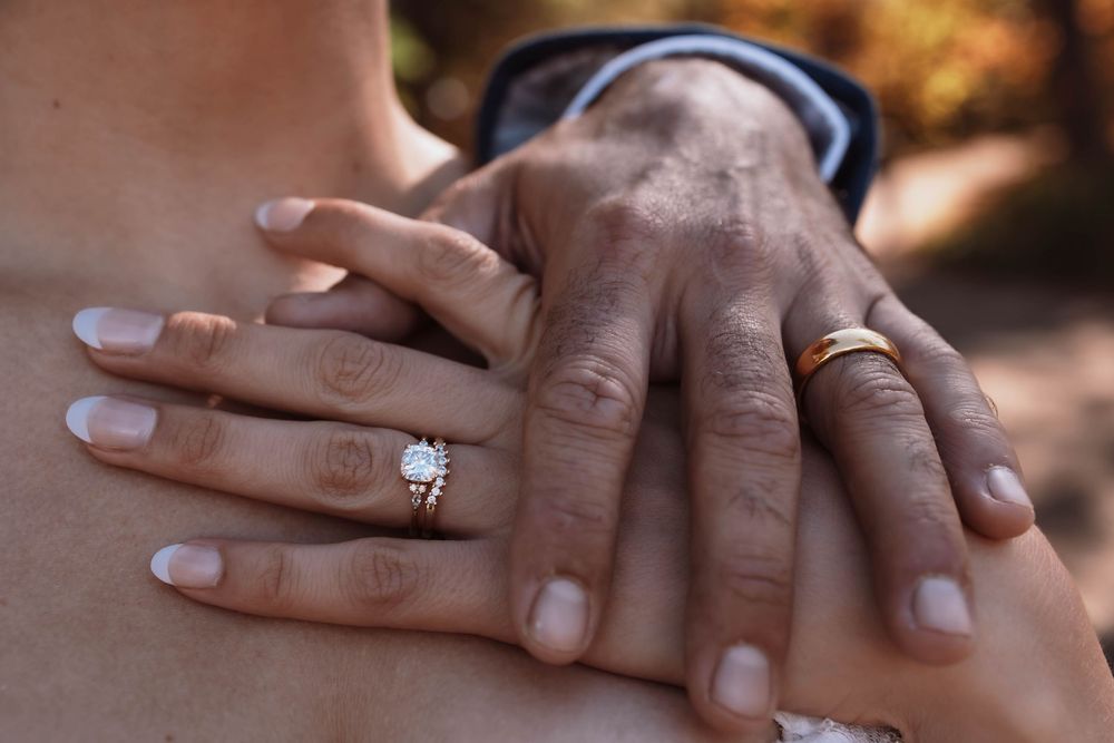Bride and Groom wedding band detail shot at an adventure elopement at Minnewaska State Park NY