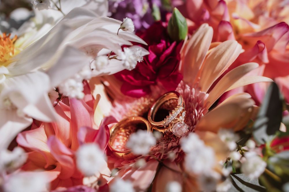 Wedding bands and bridal bouquet detail shot at adventure elopement Minnewaska State Park