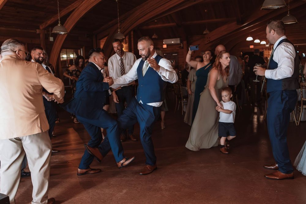 Groom dancing at West Point wedding