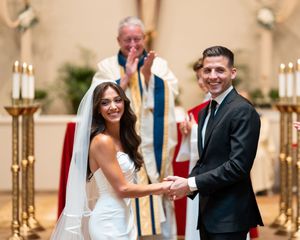 Wedding ceremony moments captured in a church with religious symbols and decor.