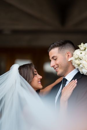 Close-up wedding portrait sequence showing tender moments between newlyweds.