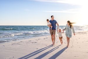 Sea Glass Photography of Navarre, Florida offers stunning beach lifestyle candids and traditional family portraits in Navarre Beach, Fl.