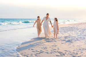 Sea Glass Photography of Navarre, Florida offers stunning beach lifestyle candids and traditional family portraits in Navarre Beach, Fl.
