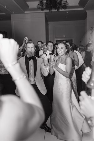 Black and white photos of wedding reception dancing and celebrations.