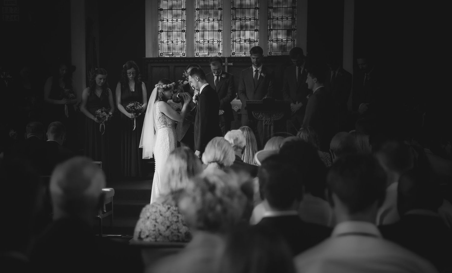 Non-Traditional Wedding Photography, bride and groom reading vows