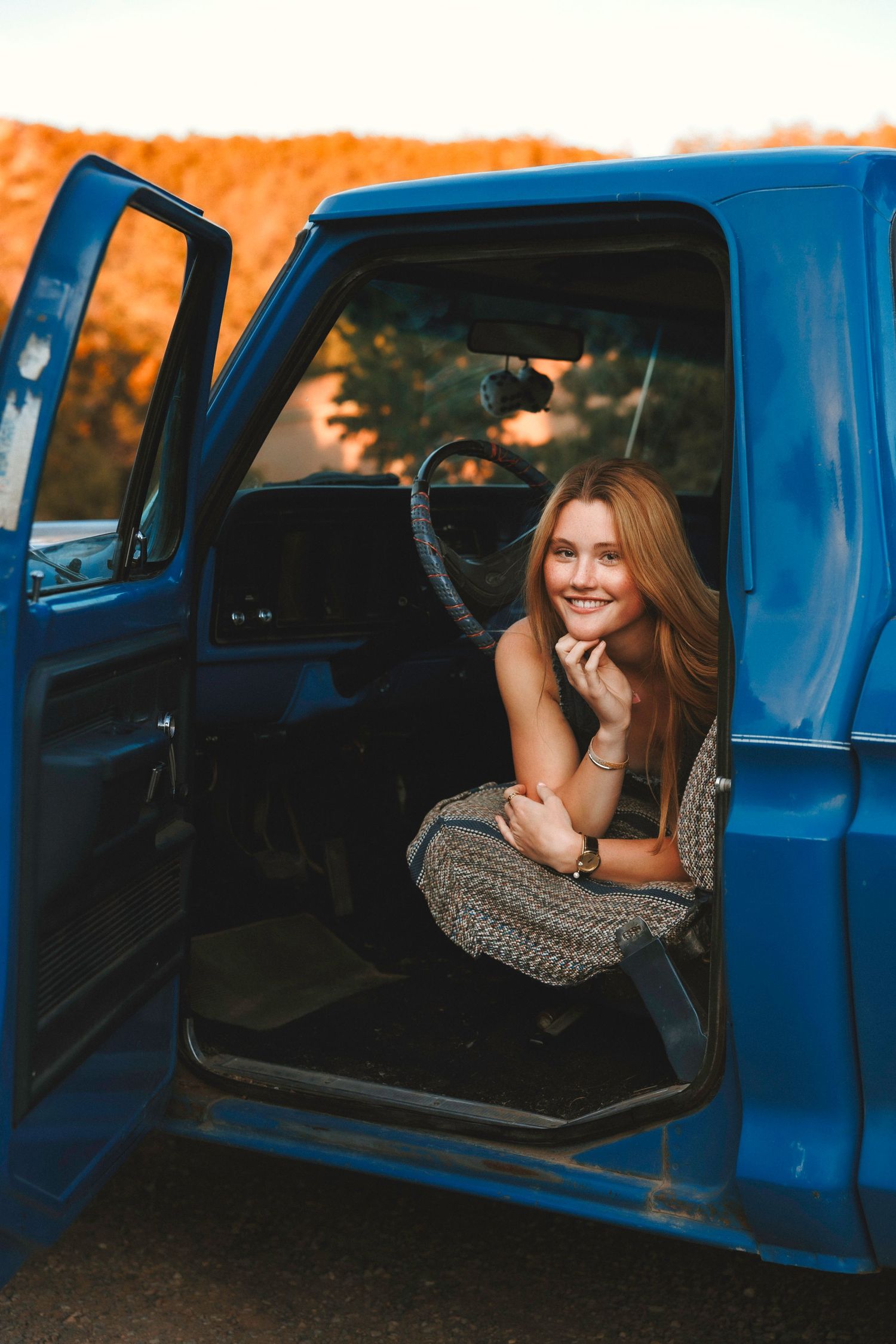 Santa Fe senior portrait with beautiful moody moutain backdrops and natural, organic golden light