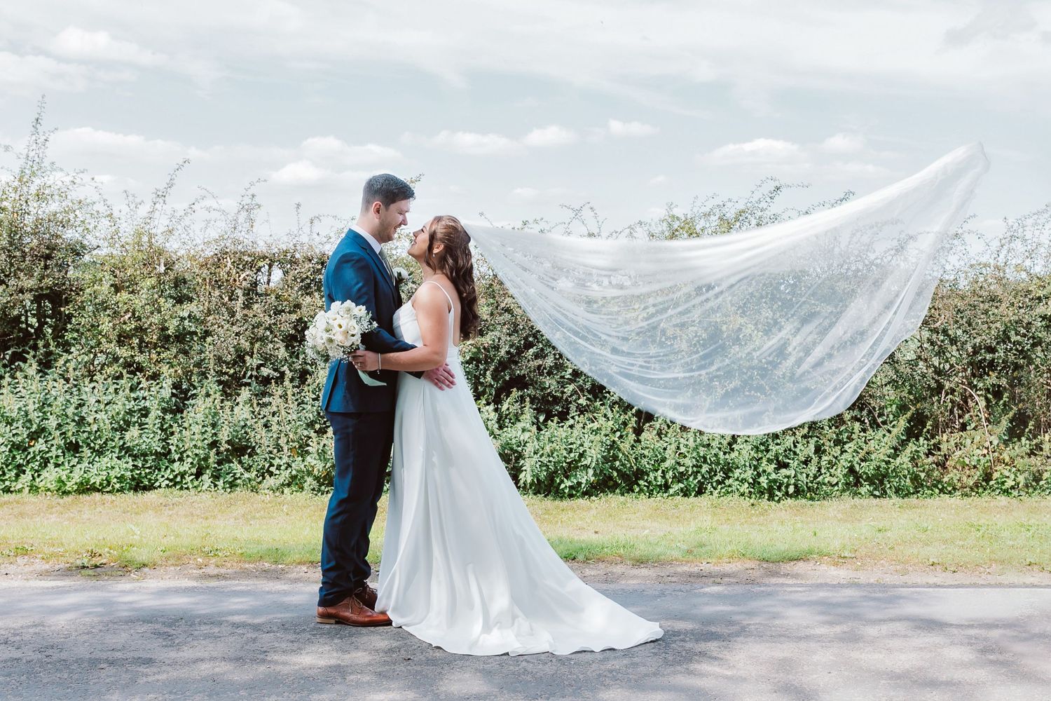 Romantic wedding portrait with flowing veil against natural landscape. Photographer. Hull. East Yorkshire. Photography