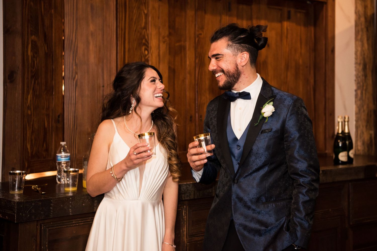 Newly married couple toasting their wedding day at Blame Her Ranch.