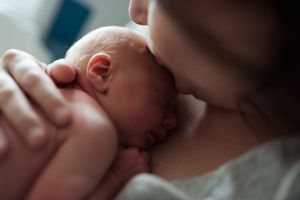 Close-up detail of a sleeping infant's features.