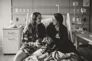Black and white photograph showing a hospital room setting.