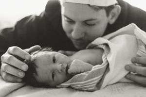 Monochrome photograph capturing a quiet feeding session.