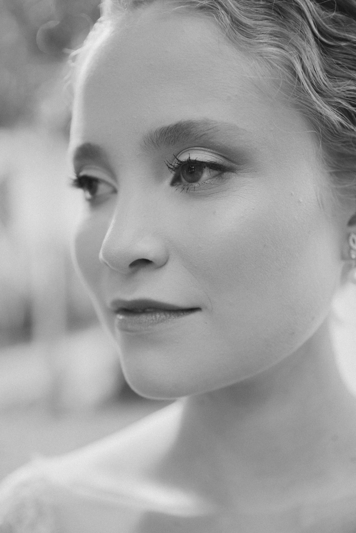 Artistic black and white close-up bridal portrait.