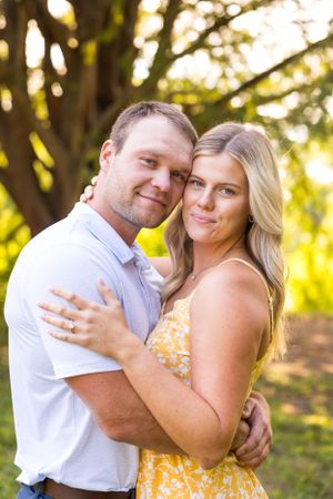 Engaged couple in a park