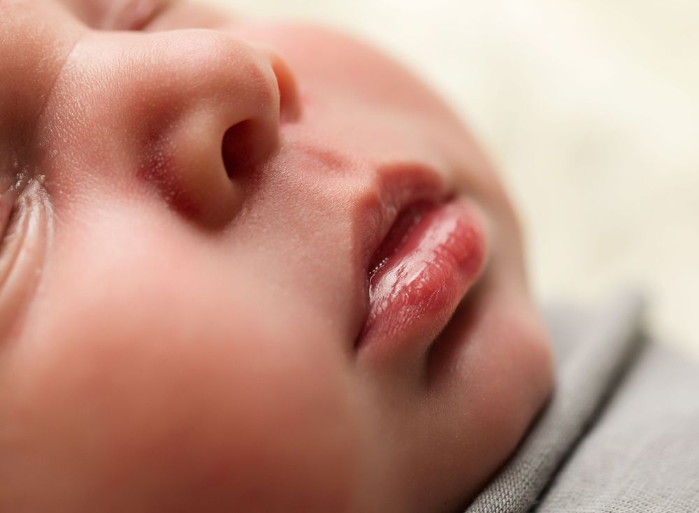 macro photo of newborn baby lips