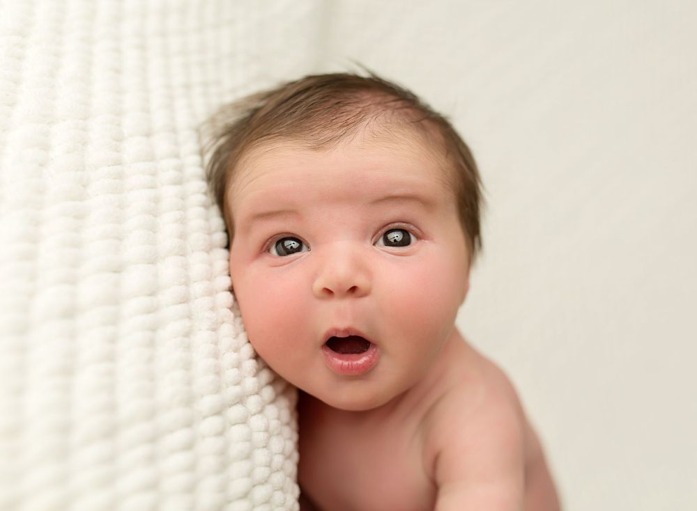 newborn baby with eyes open