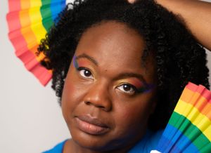 Close-up portrait series with rainbow fan and vibrant makeup.