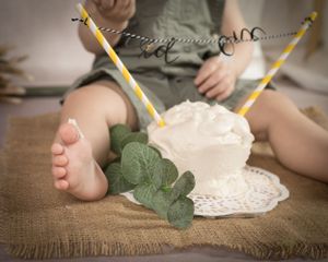 A series of images showing small feet and cake on burlap fabric with white paper and green leaves.