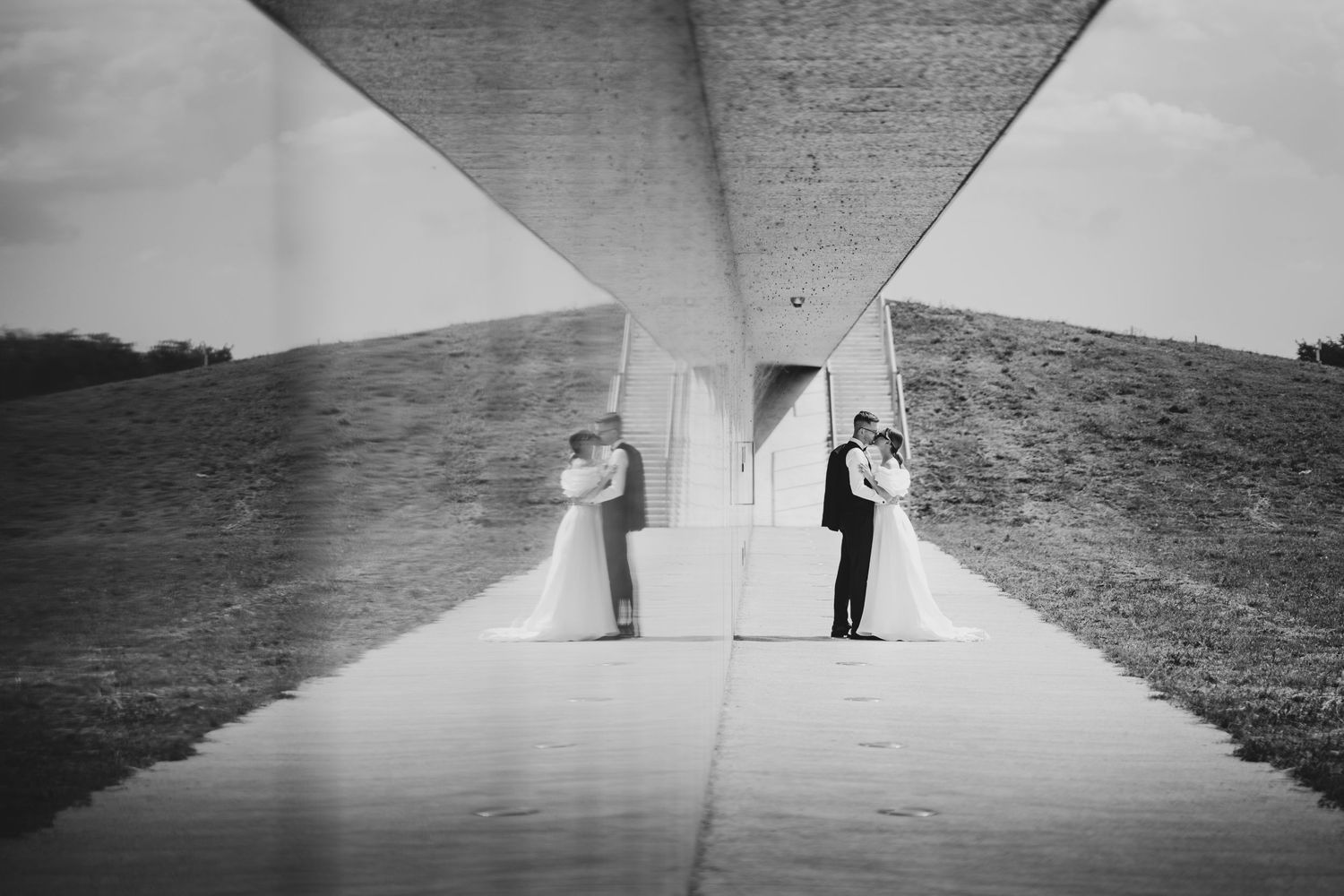 Minimalist black and white architectural wedding photos with geometric shadows.