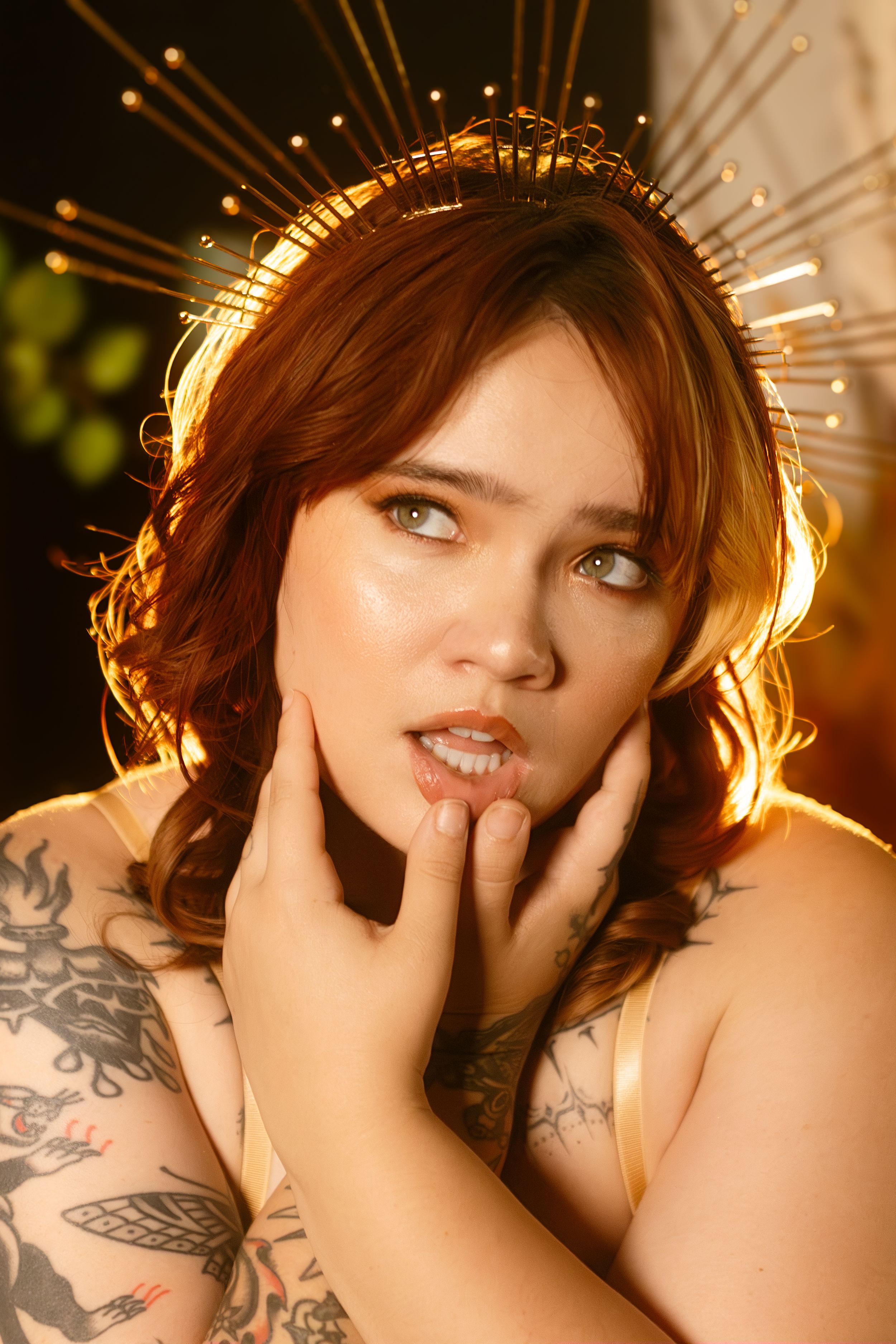 Artistic portrait with backlighting features a subject posing expressively in a Fort Worth photography studio, Lock and Key Photography.