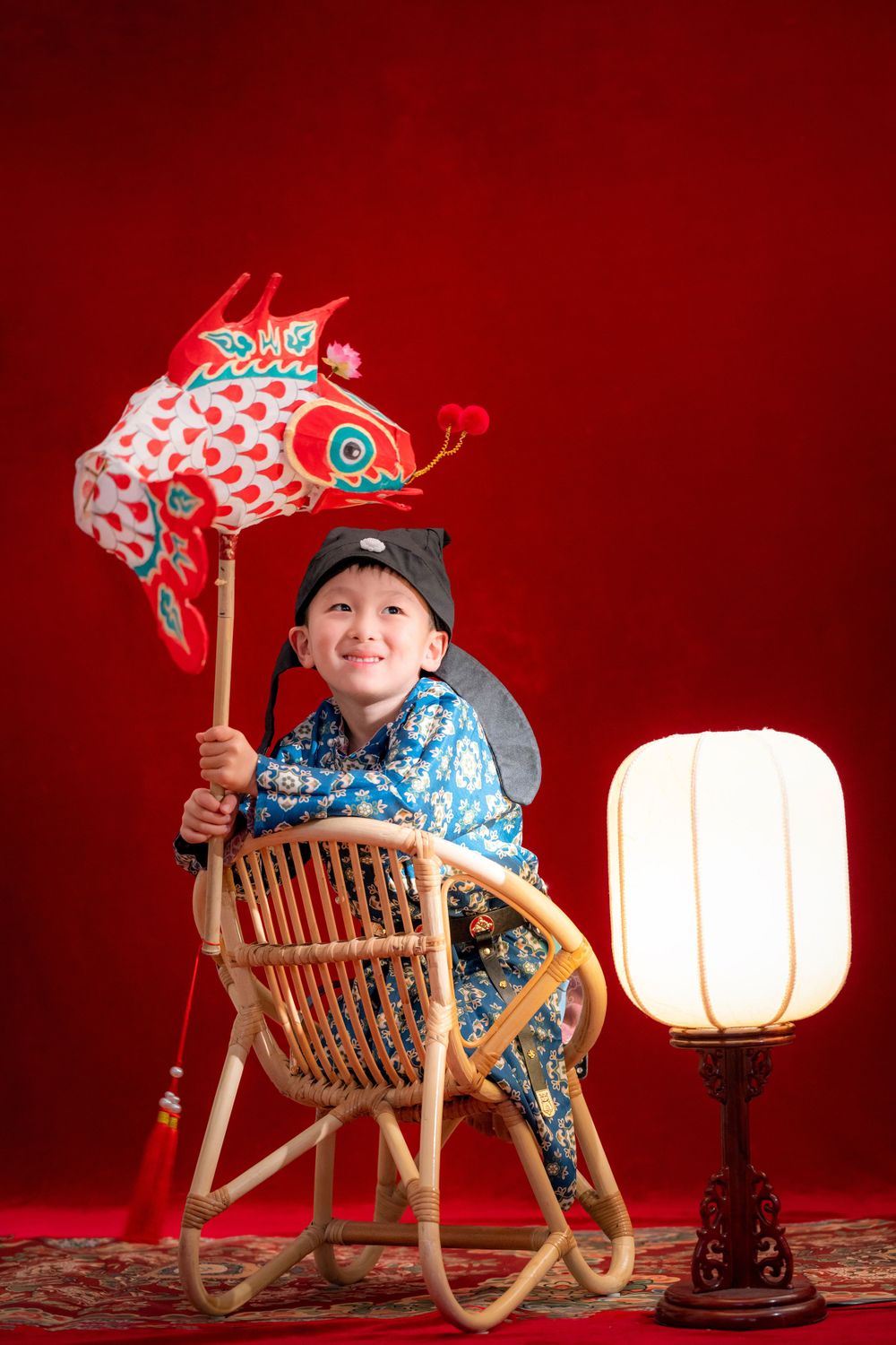 Cinematic Tang Dynasty Hanfu maternity and family studio portrait with dramatic lighting, by Imagine Image Studio Auckland.