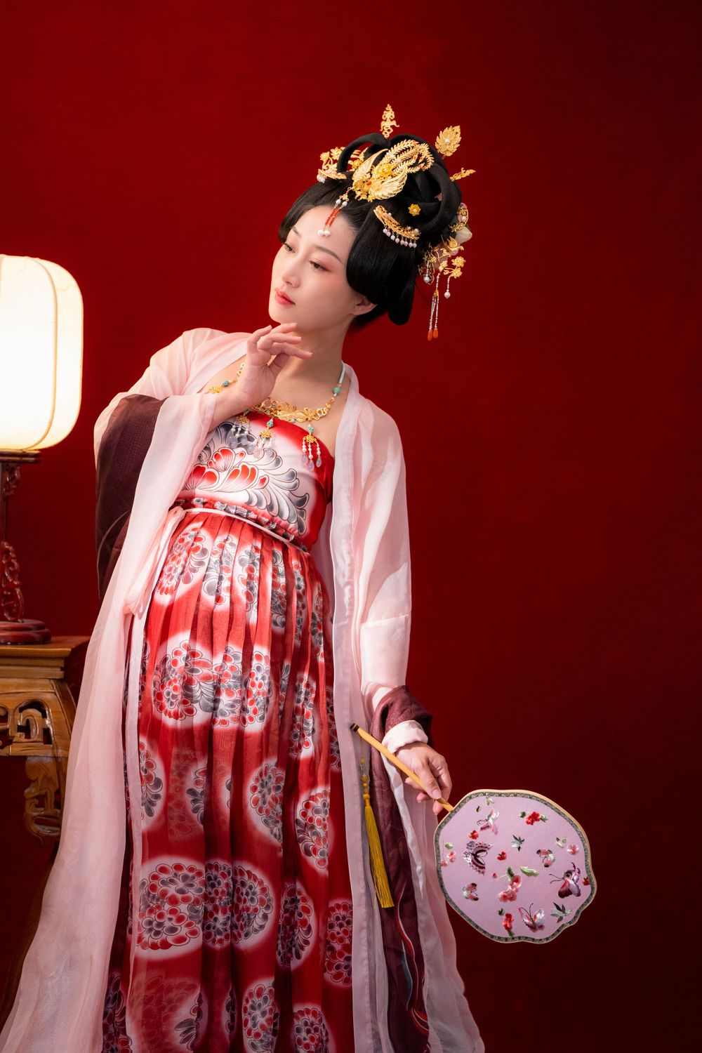 Cinematic Tang Dynasty Hanfu maternity and family studio portrait with dramatic lighting, by Imagine Image Studio Auckland.