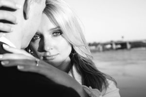 Artistic black and white portrait in a dreamy style shot outdoors.