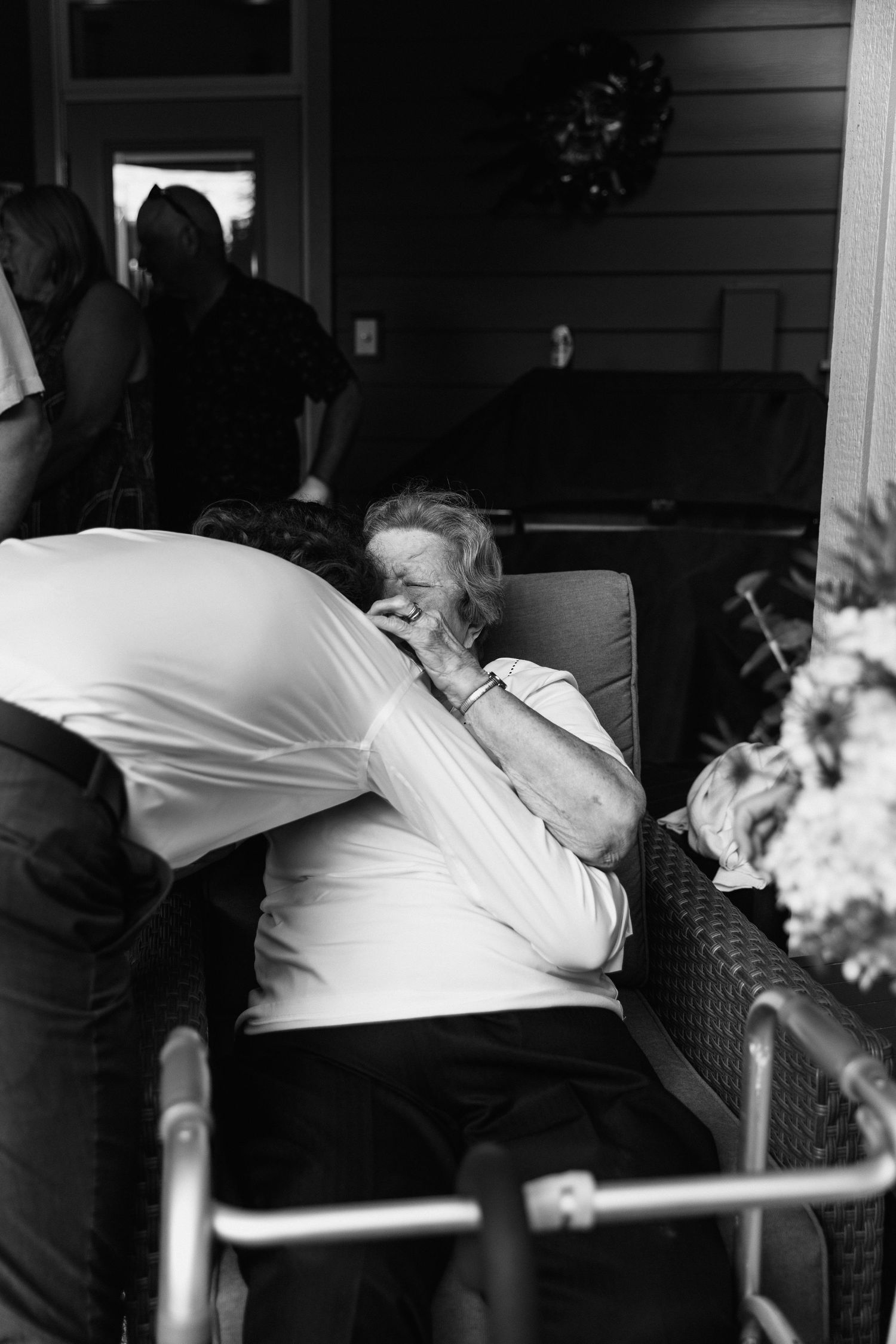 A black and white photo sequence shows someone leaning over and falling onto a couch or chair in a dramatic fashion.